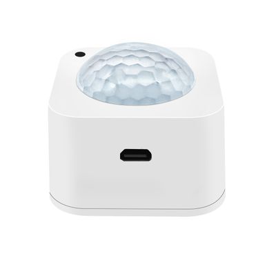 Texturerad kupolformad sensorenhet med sidoport, perfekt för automatisering av LED-belysning och integrering i smarta hem.
