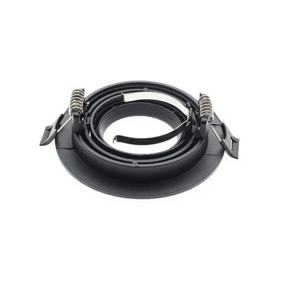 Svart rund LED-armatur med metallfästen och fjädrar för säker installation. Idealisk för LED-belysningsinstallationer och armaturer.