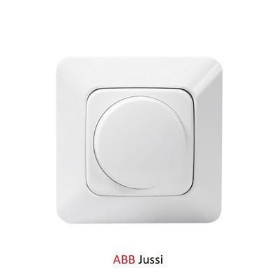 Vit ABB Jussi väggströmbrytare för LED-belysning, rund tryckknapp och fyrkantig bas, modern design.