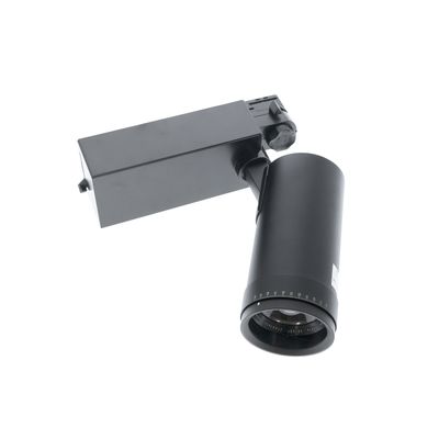 Modern svart skenlampa med en cylindrisk lampa på en rektangulär bas, diagonalt mot en vit bakgrund i en vinkel för en snygg belysningslösning.