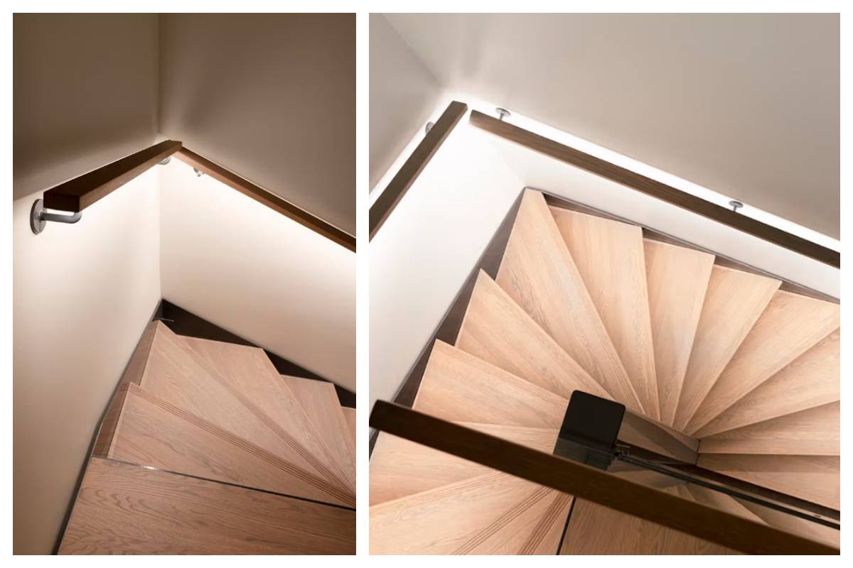 En trätrappa med metallräcke, sedd uppifrån och från sidan - ett modernt belysningssystem från LedStore.fi framhäver denna eleganta detalj i familjen Kaitamäkis hem i Esbo.