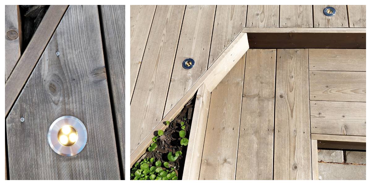 Närbild och större vy av moderna, runda LED-armaturer för stämningsbelysning. Armaturerna är avsedda för utomhusbruk i vedeldade eldstäder med gröna växter mellan terrasserna. 